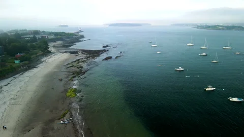 Pullback Drone Shot of Foggy Atlantic Bay with Boats – Portland, Maine – 4K 24fp Stock-Footage 313856756
