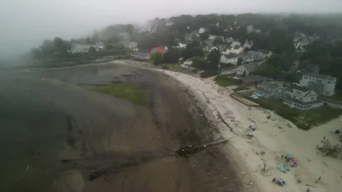 Pullback Drone Shot of Foggy Atlantic Bay with Boats – Portland, Maine – 4K 30fp Stock Footage 313862610