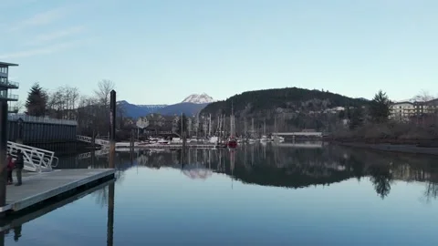 Pullback Flight Over Mamquam Blind Channel In Squamish, BC, Canada, With Harbor Stock Footage 332640160