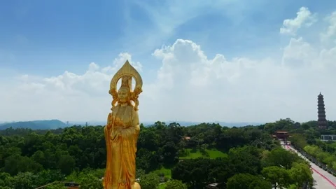 Pullback from Guanyin to a wider temple landscape in Guangzhou China Video stock 345958982