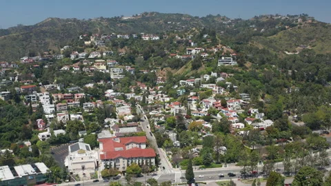 Pullback Hollywood Hills homes and houses near Los Angeles Beverly Hills LA Stock Footage 273840460
