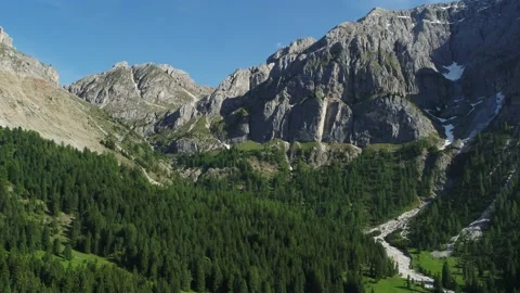 Pullback from Mountains, Aerial over beautiful meadows and forest in the Alps Stock Footage 132064940