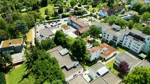 Pullback over Mediacampus Frankfurt with hillside surroundings Stock Footage 331876177