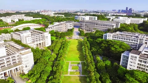 Pullback over South China Normal campus entrance in Guangzhou China Stock Footage 345959710