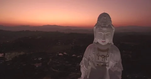 Pullback Reveal of Guan Yin Statue in Chiang Rai Mountains, Northern Thailand Stock Footage 74051557