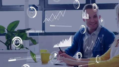 Pullback revealing man writing woman joining HUD graphs overlaying plant papers Stock Footage 332804418