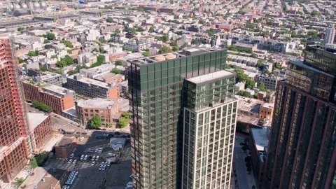 Pullback Shot Of High Rise Futuristic Bu... | Stock Video | Pond5