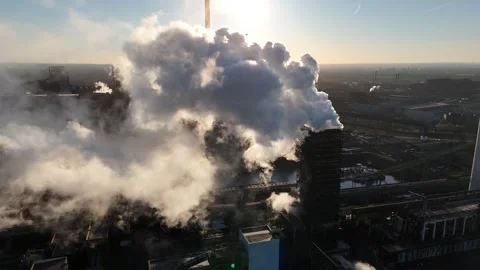 Pullback from smoke cloud into full harbor industry view Stock Footage 337168858