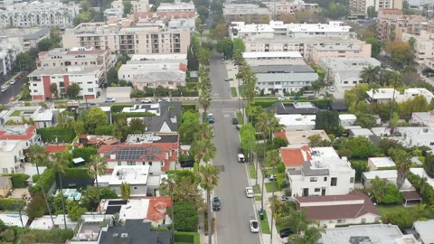 Pullback top dop down shot of Beverly Hills suburban neighborhood in California Stock Footage 273957352