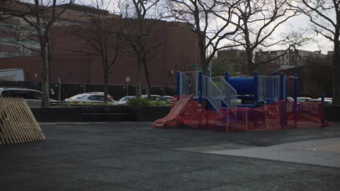 Pulled back view of closed down playground during covid pandemic nyc Vídeos de archivo 251192217