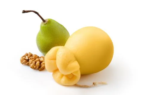 Pulled caciocavallo or scamorzza italian yellow cheese with pear and walnut Foto stock