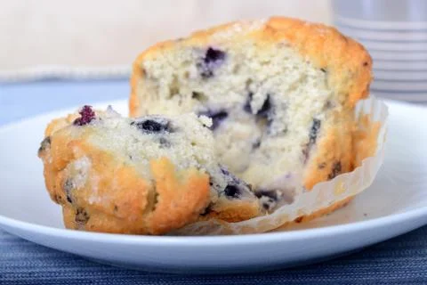 Pulled open fresh blueberry muffin Stock Photos