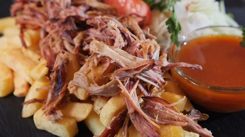 Pulled pork fast food menu with delicious meat served along french fries 動画素材 105720963