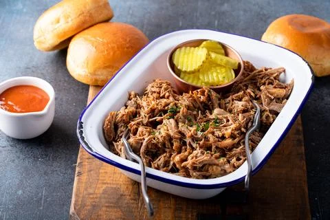 Pulled pork on a serving platter, ready to eat Stock Photos