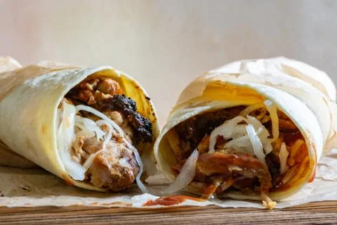 Pulled Pork Wraps with hot BBQ sauce with white background 스톡 사진