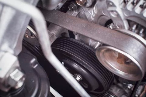 Pulley deteriorate of a car engine. Stock Photos