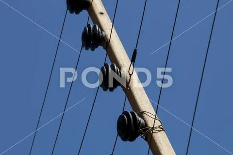 Pulleys Wire Strands and Metal Forming Electric Fence Stock Photos