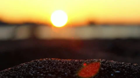 Pullfocus from sand to ocean, sunset Stock-Footage 48750392