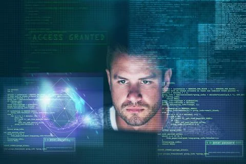 Pulling an all nighter. a focussed computer programmer working at his computer Stockfoto's