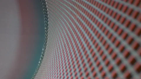 Pulling away from a curved metal grid, blue on one side, red on the other. Stock Footage 162027992