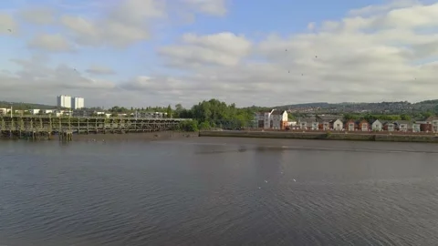 Pulling away from Dunston Staiths &amp; Gateshead Skyline, birds flying Video stock 132908921