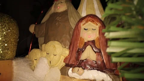 Pulling away from a manger scene Christmas tree ornament, nutcracker on Stock Footage 121664134