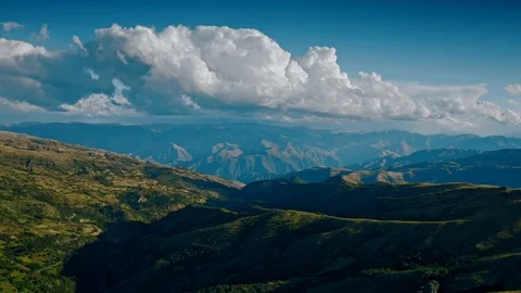 Pulling away from massive clouds above the Apurimac valley, Peru Stock Footage 115369507