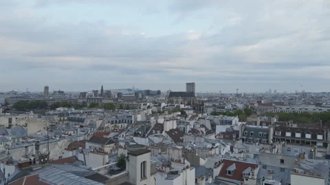 Pulling away from the residential dwellings that line the Seine in Paris Stock Footage 244854934