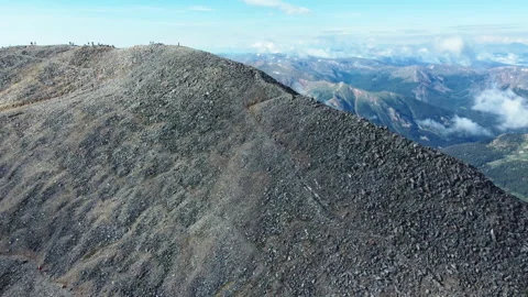 Pulling away from the ridgeline of Torreys Peak to reveal the Rockies Stock Footage 247363829