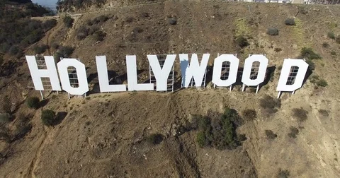 Pulling back and out from Hollywood sign aerial on mountain and hills LA 4K Stock Footage 70741910