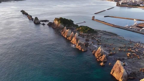 Pulling Back and Rising Above Hashigui-iwa Rocks, Japan Video stock 342238455