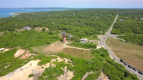 Pulling Back from the Lighthouse at Martha's Vineyard to Reveal a Wide Video stock 138850542