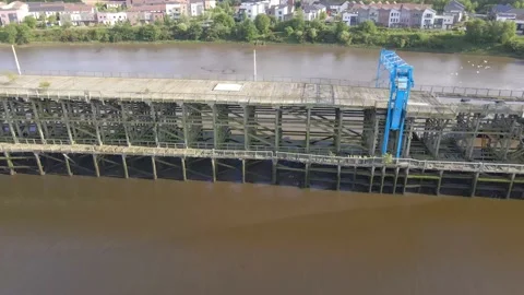 Pulling back to reveal more of Dunston Staiths in profile Stock Footage 132902614