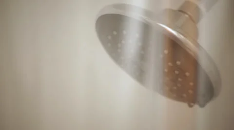 Pulling back shower curtain and turning on shower head Stock Footage 67274409