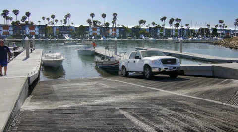 Pulling boat out of the water in a local marina in California Stock-Footage 51431894