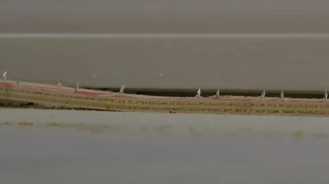 Pulling up carpet gripper with crowbar, 4K Stock Footage 59171357