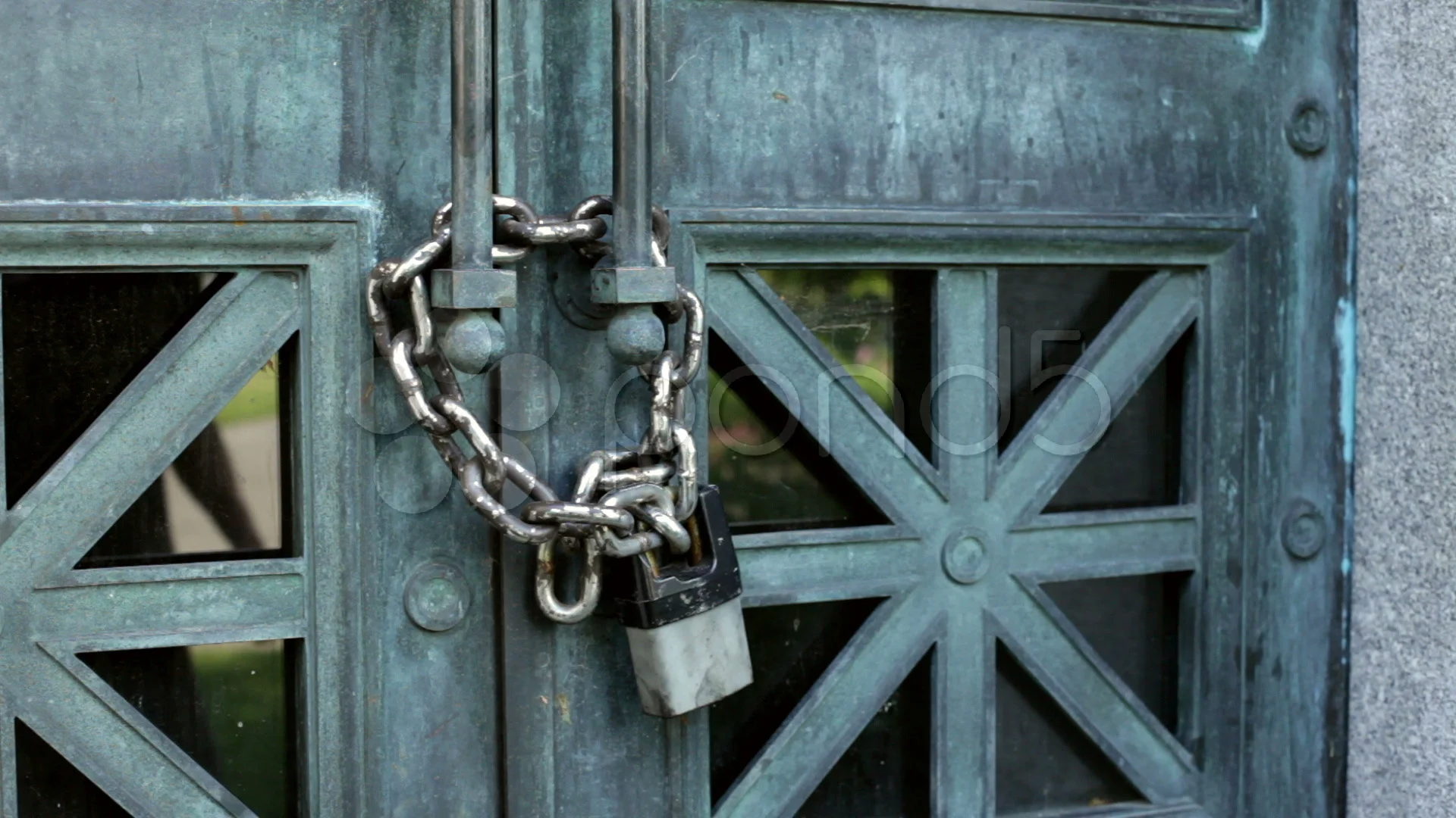 Pulling on Chain on Locked Door | Stock Video | Pond5