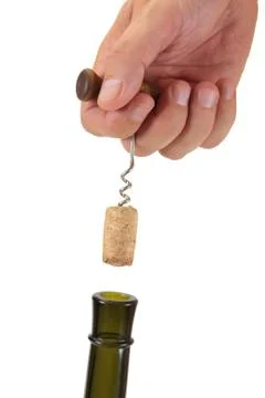 Pulling corkscrew cork from the bottle 스톡 사진