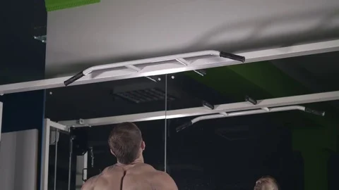 Pulling on the crossbar Stock Footage 76541740