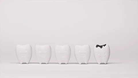 Pulling Decay tooth model among Good Teeth Stock Footage 103354980