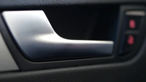 Pulling door lever to leave the car Stock Footage 88411139