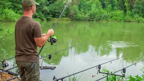 Pulling a fish hook out of the water Stock Footage 112173264