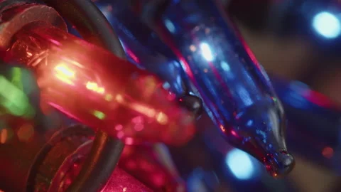 Pulling focus on bulbs of electric string 4K video Video stock 195310316