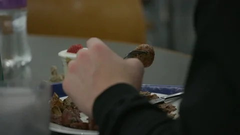 Pulling focus from food to a drink Stock Footage 103867698