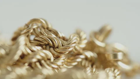 Pulling focus on golden curb chain 4K video Stock Footage 172062877