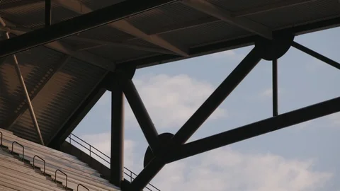 Pulling focus into rafters in a stadium Stock Footage 102132962