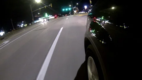 Pulling into a Gas Station at Night Stock Footage 86585690