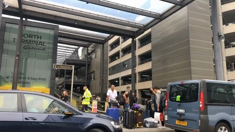 Pulling into Gatwick North drop off enterance Stock Footage 112122089