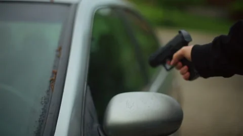 Pulling gun on car carjacking Stock Footage 62795828