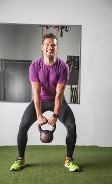 Pulling a kettlebell Stock Photos